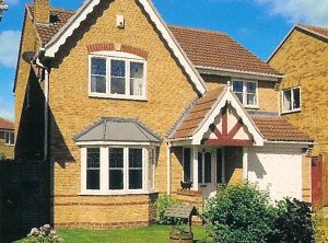 House featuring white bay window